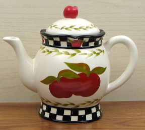 Ceramic Apple Teapot   Measures: 7 1/4" H x 8 1/2 W x 5" D.